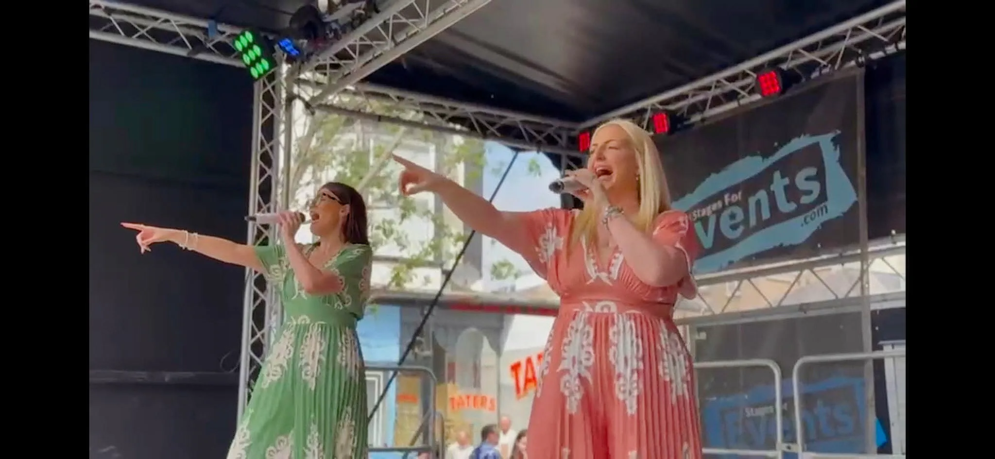 Han and fran singing on stage
