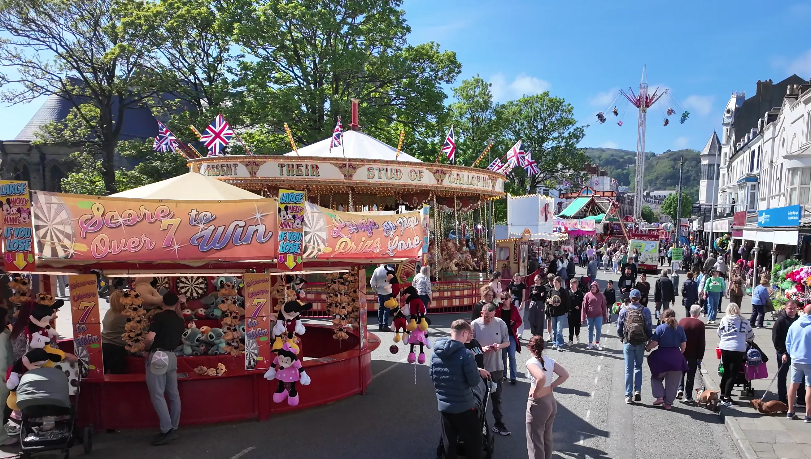 Victorian fair ground rides on the street
